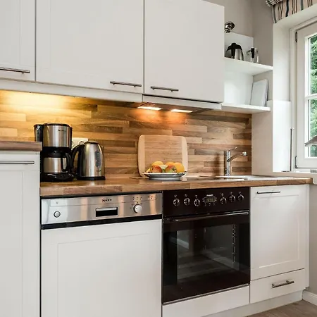 Tunghoern-hues-eg-wohnung-01 Апартаменты Кайтум